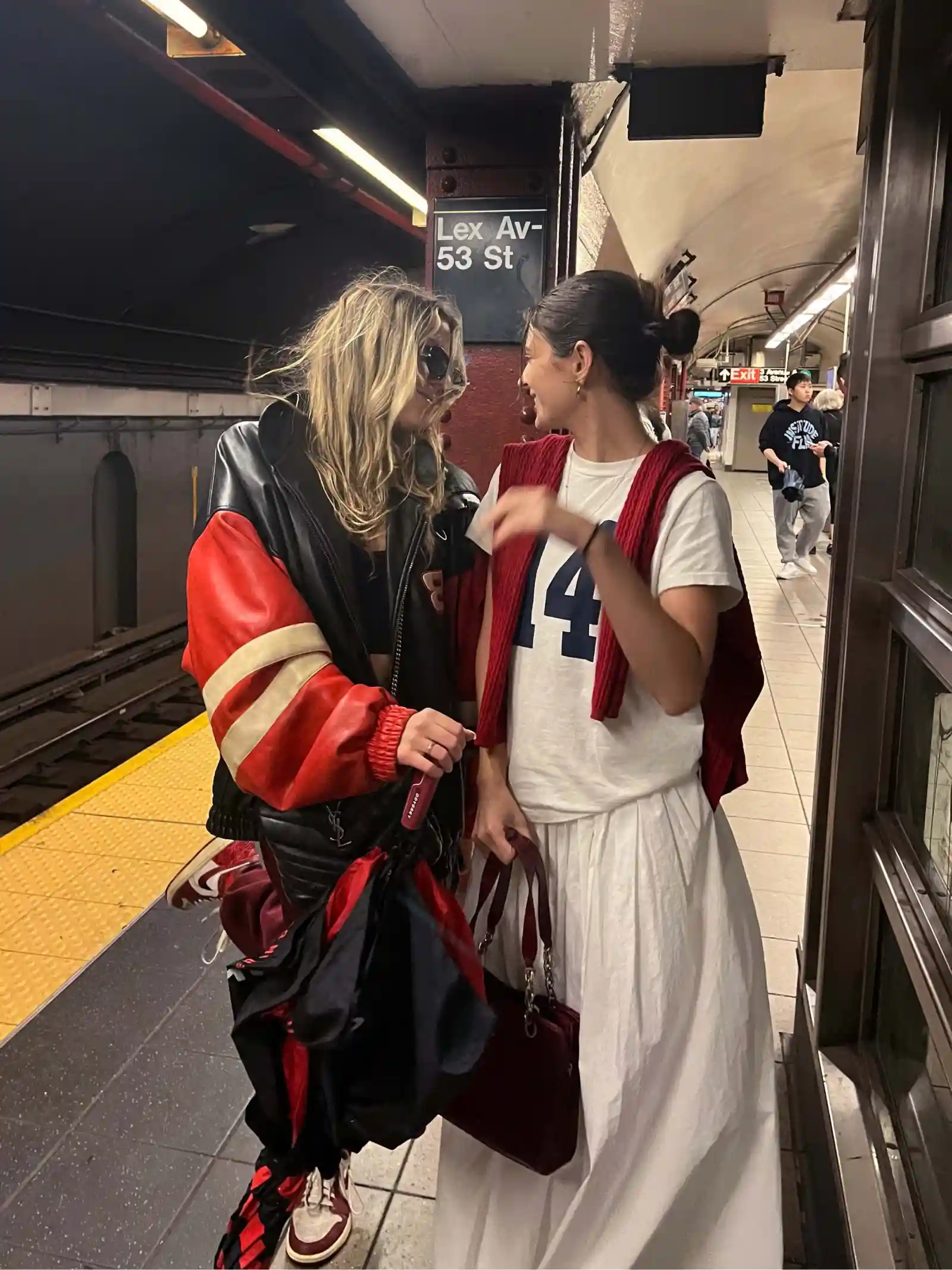 Find this outfit– Two stylish girls waiting for the subway